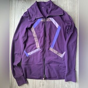 Lululemon zip up jacket with unique logo design